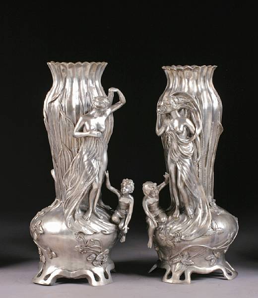 Appraisal: A pair of Art Nouveau style silvered bronze vases Each