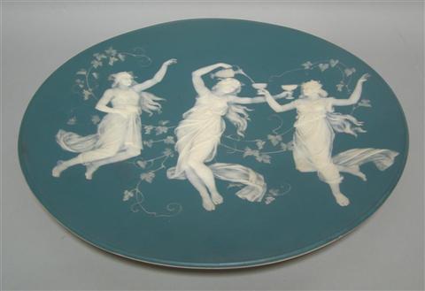 Appraisal: METTLACH NEOCLASSICAL PORCELAIN CHARGER Impressed mark dated and depicting three