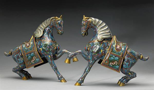 Appraisal: A pair of archaistic cloisonn enameled metal horses Each of