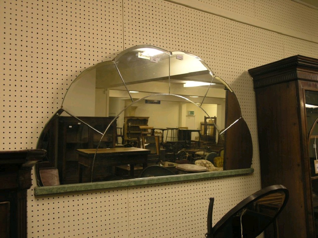 Appraisal: An Art Deco style mirror cloud-shape with green painted wood