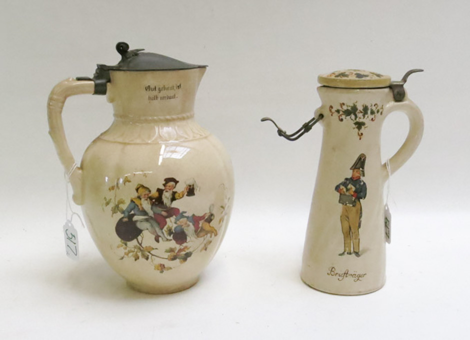 Appraisal: TWO METTLACH POTTERY LIDDED PITCHERS with print under glaze with