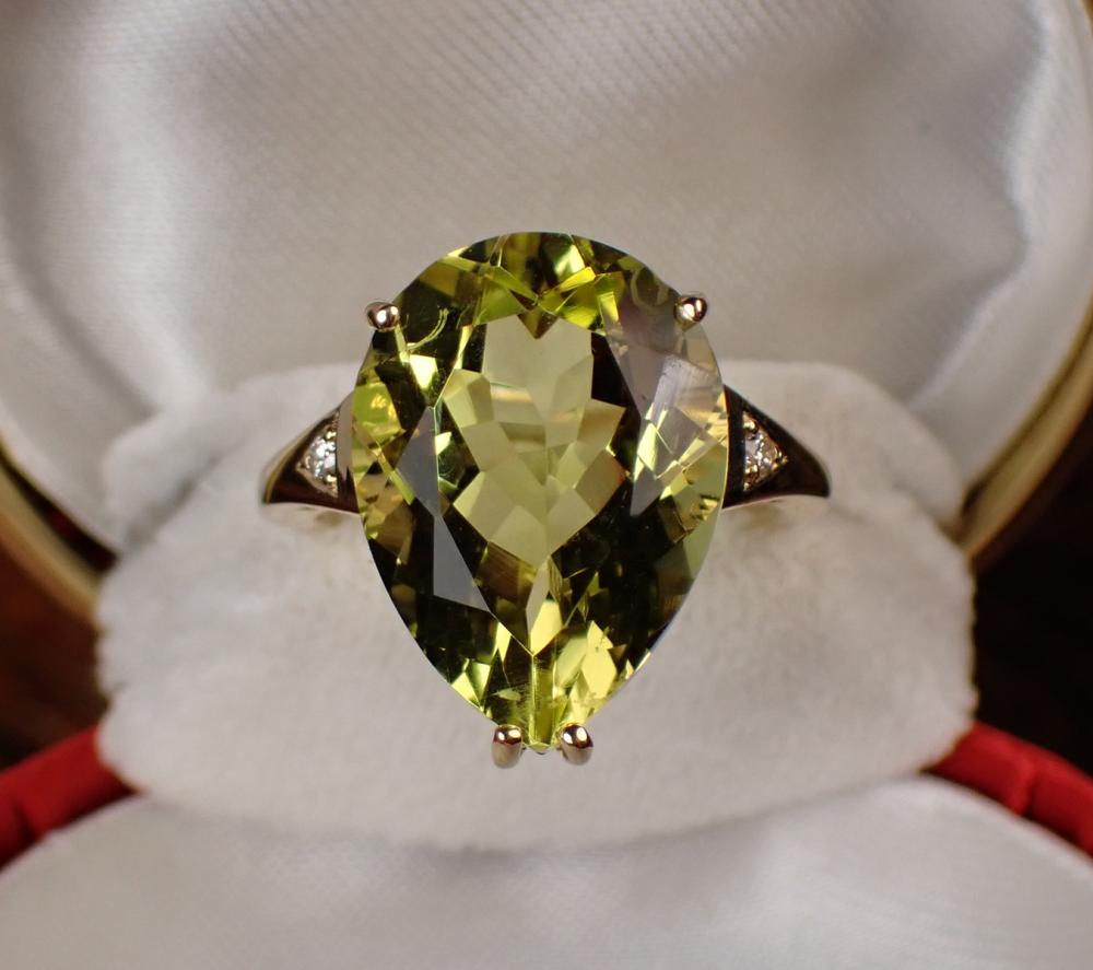 Appraisal: LEMON QUARTZ DIAMOND AND FOURTEEN KARAT GOLD RING The k