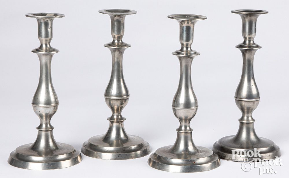 Appraisal: Set of four pewter candlesticks th c Set of four