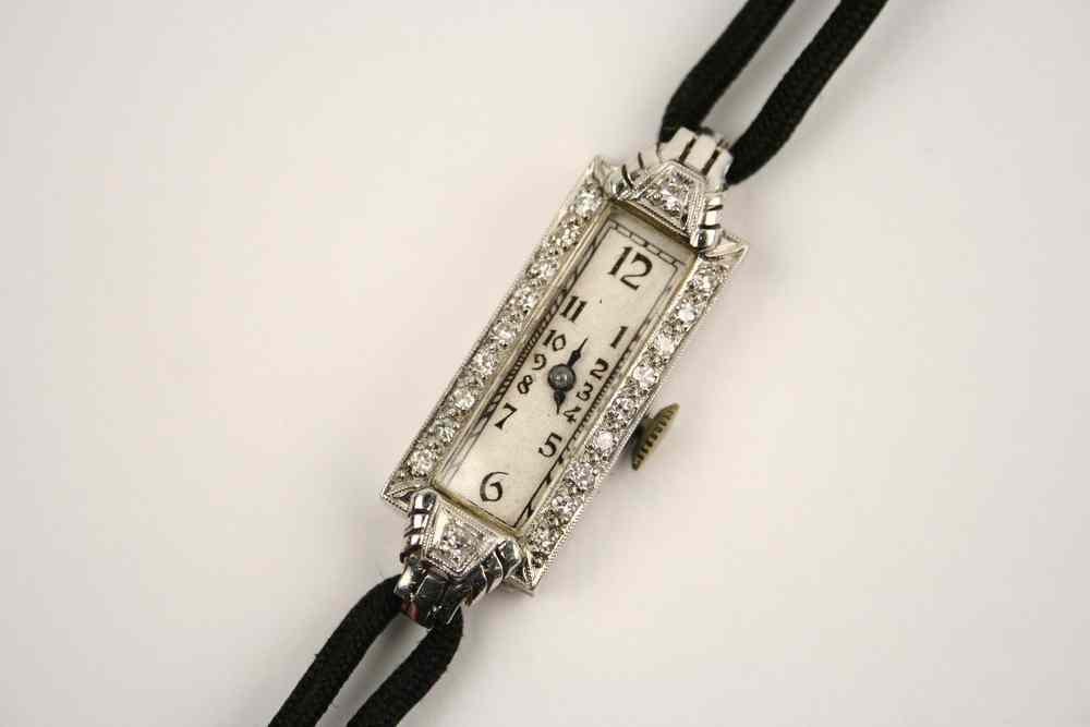 Appraisal: LADY'S WRISTWATCH - Circa - lady's platinum and diamond wristwatch