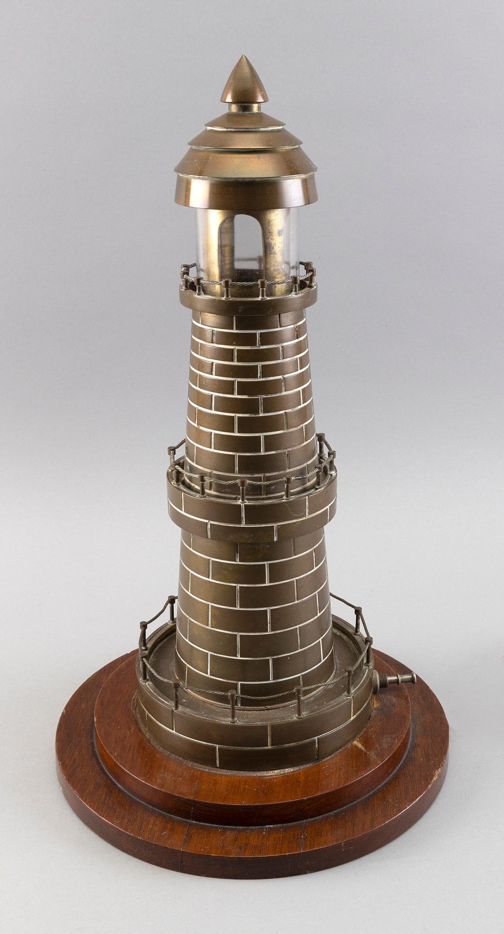 Appraisal: BRASS LIGHTHOUSE-FORM LAMP TH CENTURY HEIGHT BRASS LIGHTHOUSE-FORM LAMP th