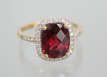 Appraisal: A Ladies' Diamond and Garnet Ring k yellow and white