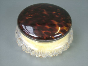 Appraisal: A silver mounted cut glass powder jar London with tortoiseshell