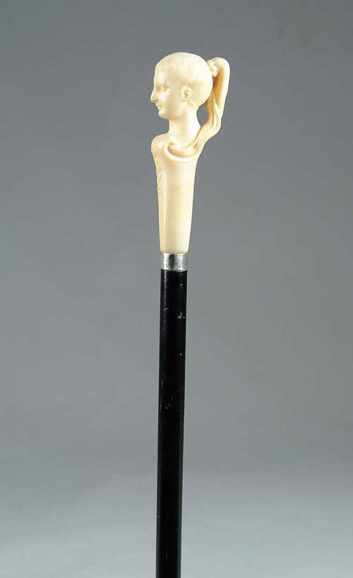 Appraisal: CARVED IVORY HANDLED CANE Carved ivory - maiden s bust