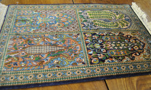 Appraisal: An unusual contemporary Persian silk rug with double-sided pile and