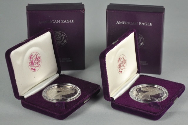 Appraisal: Two Proof Silver Eagle CoinsIn presentation box with mint COA