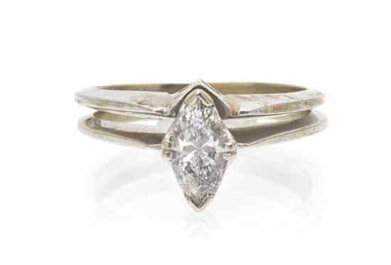 Appraisal: A Karat White Gold and Diamond Solitaire Ring containing one