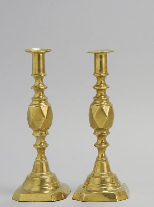 Appraisal: PAIR OF VICTORIAN BRASS CANDLESTICKS In Princess of Diamonds pattern