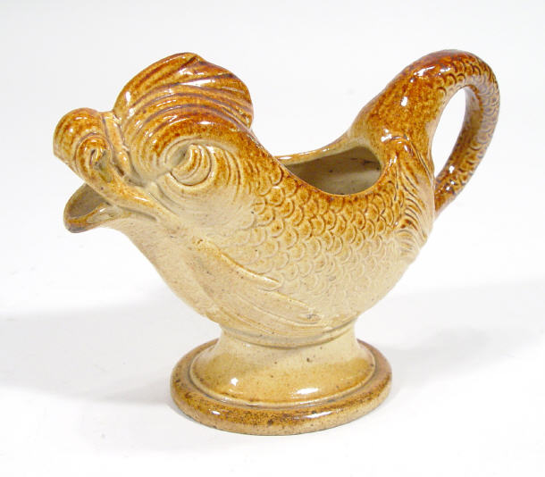 Appraisal: th Century stoneware sauce boat modelled as a fish with