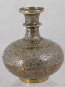 Appraisal: A brass vase possibly a hookah base with finely detailed