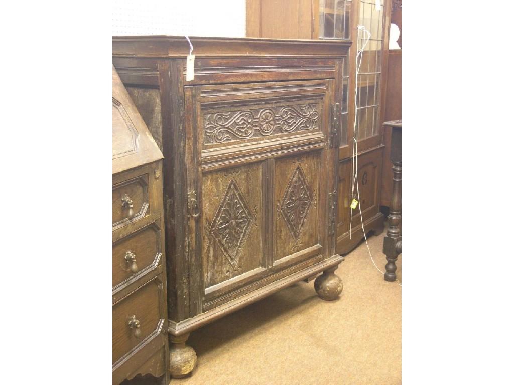 Appraisal: An th century oak side cupboard single panelled door with