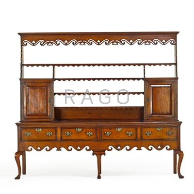 Appraisal: BRITISH WELSH DRESSER Two-piece in walnut step back top over