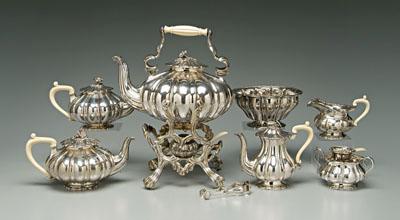 Appraisal: Viennese silver tea service melon form floral finial twist and