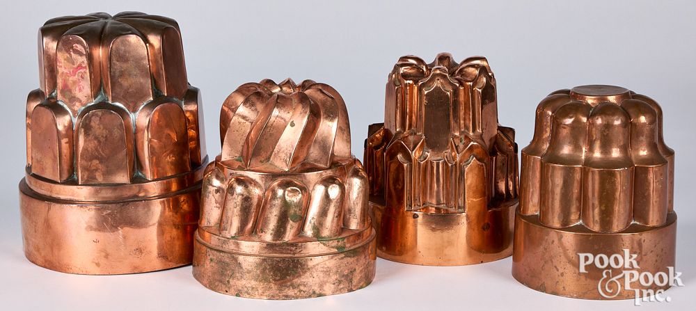 Appraisal: Four copper food molds th c tallest - Four copper