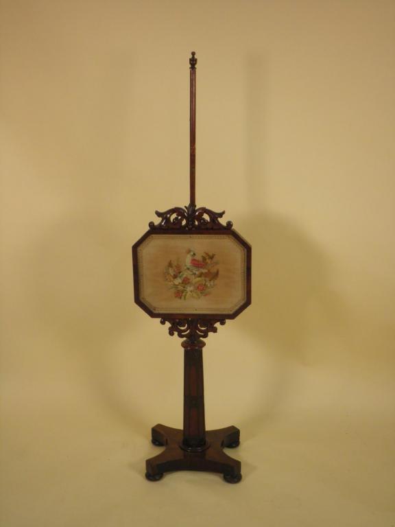 Appraisal: A William IV mahogany pole screen the canted rectangular banner