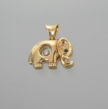 Appraisal: A Yellow Gold Elephant Pendant With A Floating Diamond A