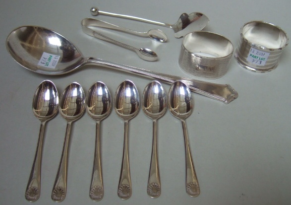 Appraisal: Silver comprising a serving spoon Birmingham two napkin rings a