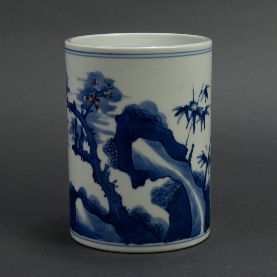 Appraisal: CHINESE UNDERGLAZE BLUE AND COPPER RED BRUSH POT Chinese underglaze