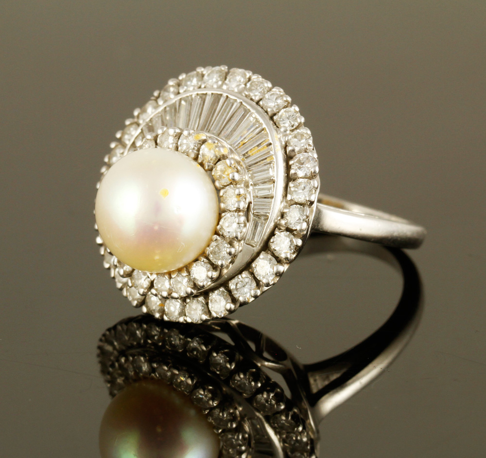 Appraisal: - Platinum Diamond and Pearl Ring Platinum diamond and lustrous