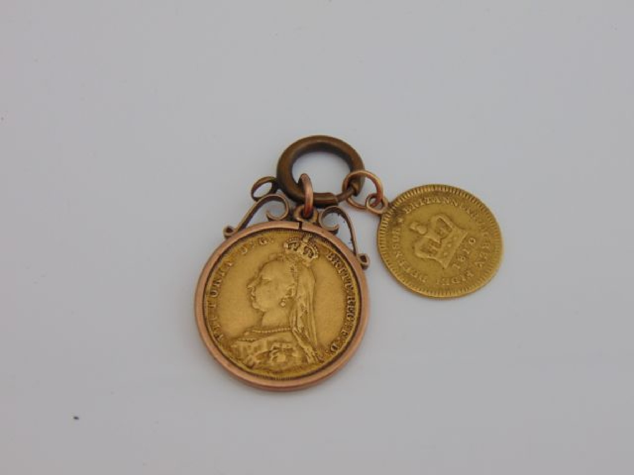 Appraisal: A Victorian sovereign coin pendant mounted in a ct rose