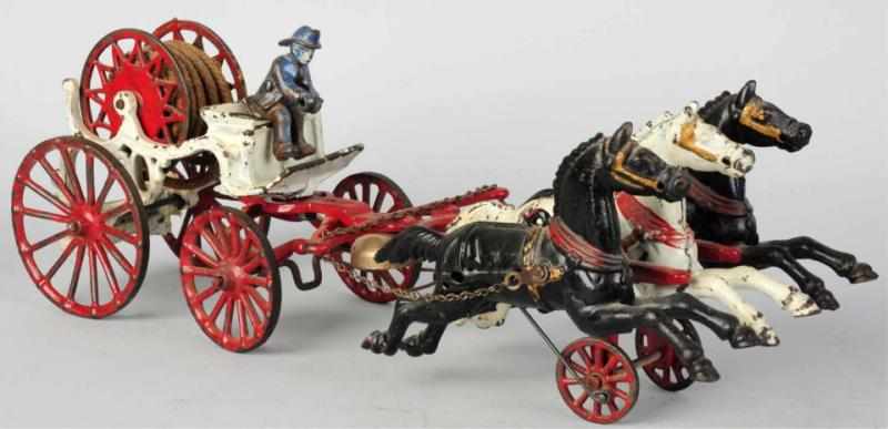 Appraisal: Cast Iron Dent Horse-Drawn Hose Reeler Toy American Pulled by