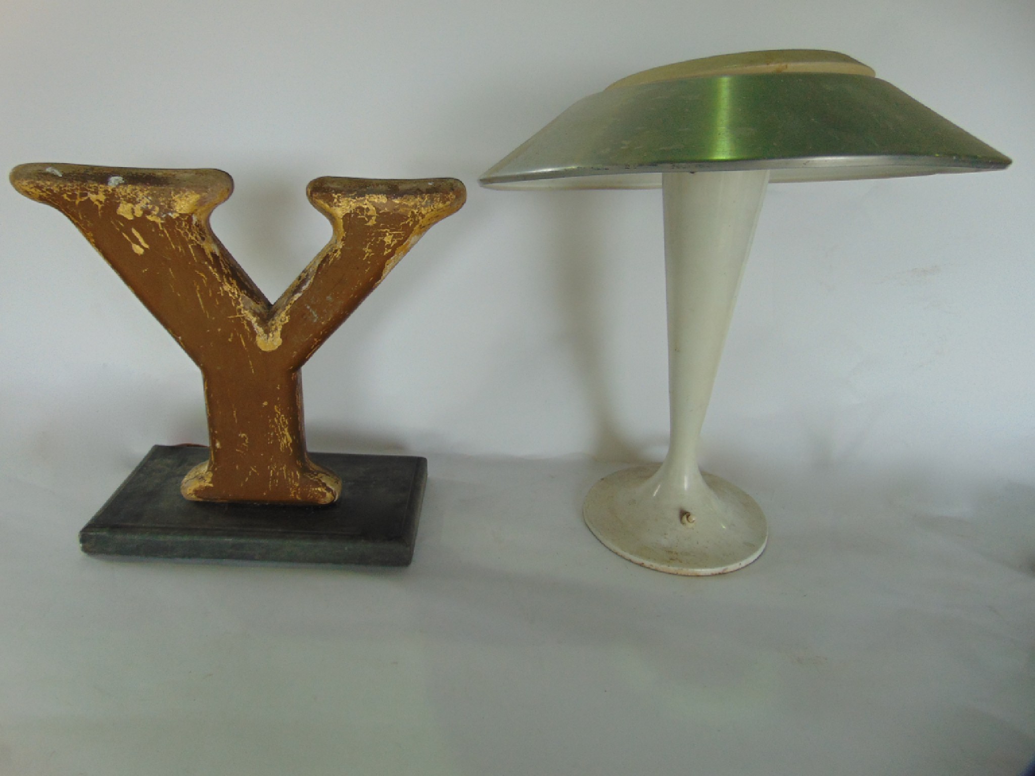 Appraisal: An unusual mid century metallic desk lamp the tapering stem