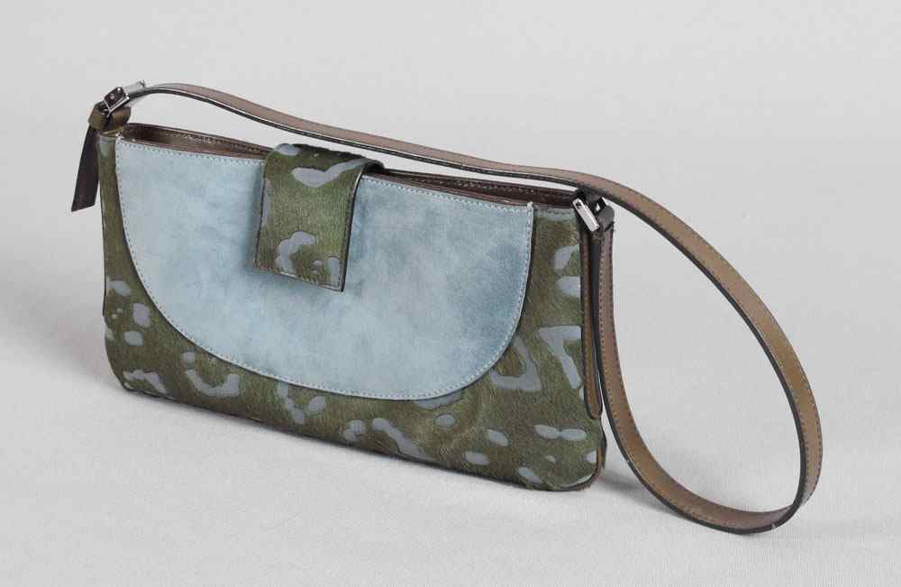 Appraisal: SALVATORE FERRAGAMMO PURSE Sculpted and dyed pony hide clutch size