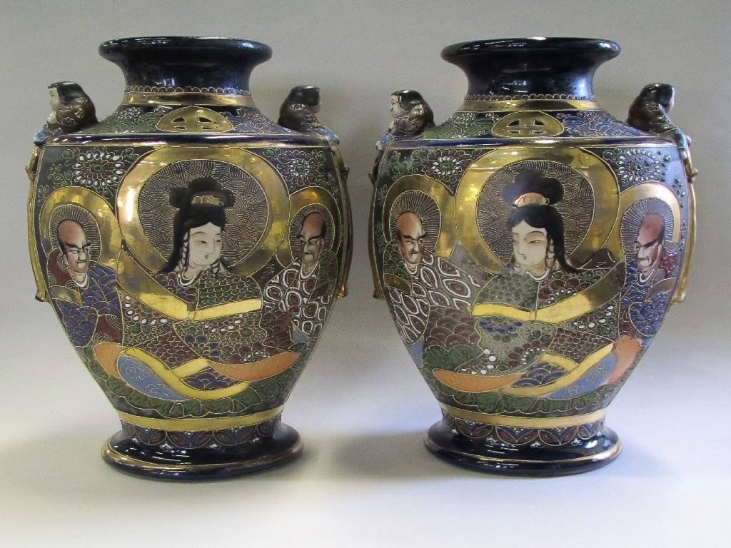 Appraisal: Pair of Satsuma vases with figural handles