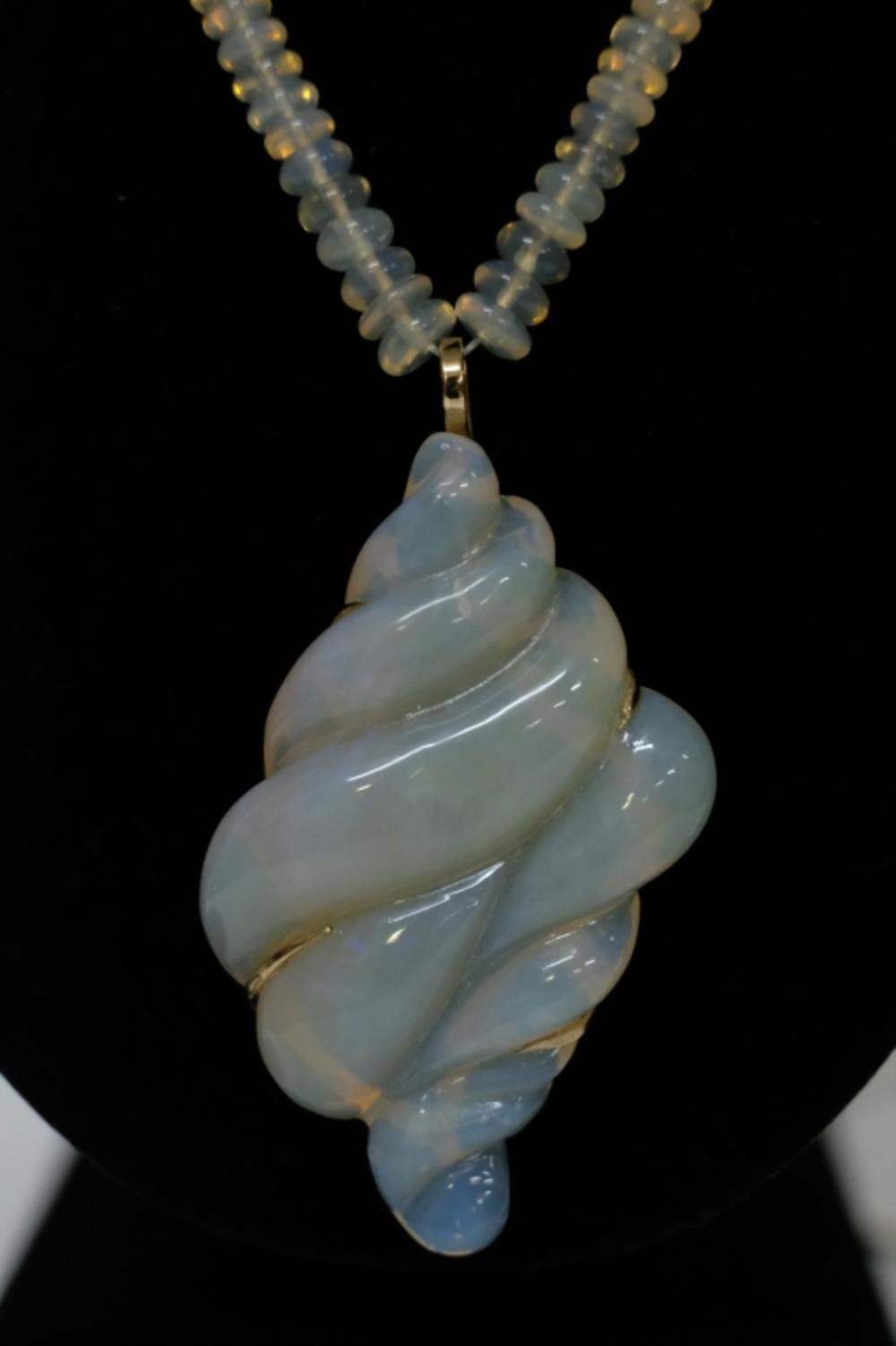 Appraisal: MASSIVE CTTW WHITE FIRE OPAL PENDANTImportant approx ct seashell carved