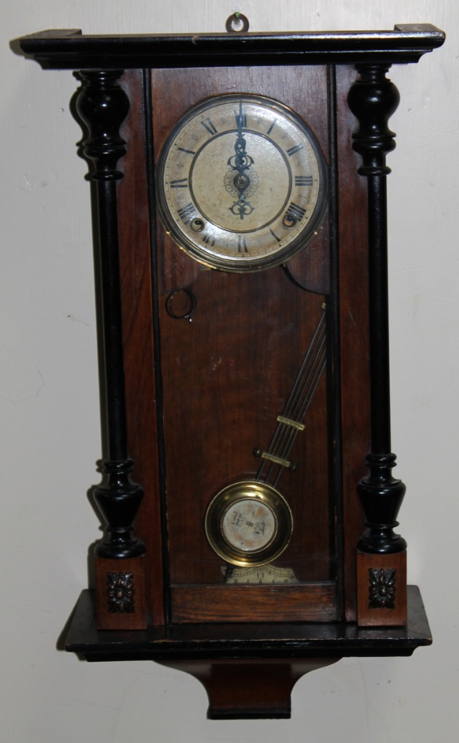 Appraisal: An early thC walnut and ebonised wall clock with a