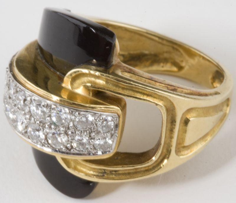 Appraisal: Onyx and Diamond Ring of chic contemporary form inlaid with