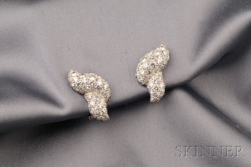 Appraisal: Platinum and Diamond Earclips each ribbon motif set throughout with