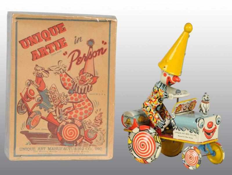 Appraisal: Tin Unique Art Artie the Clown Wind-Up Toy Description American