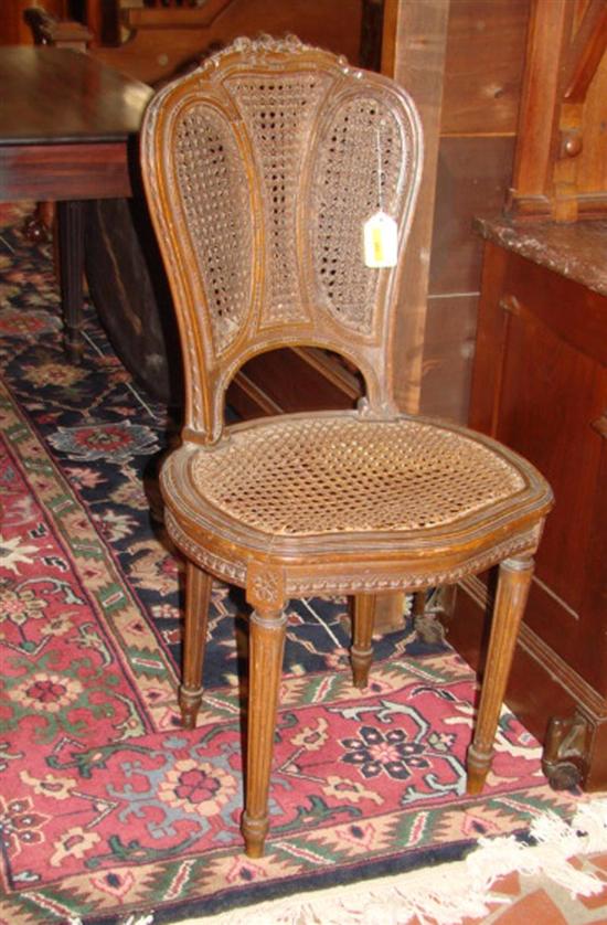 Appraisal: Louis XVI Style double caned carved beech side chair th