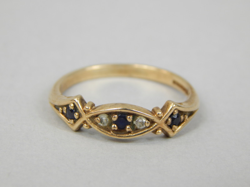 Appraisal: A ct gold dress ring set with blue and white