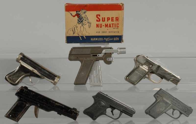 Appraisal: Lot of Cap Guns Description Includes one Nu-Matic gun with