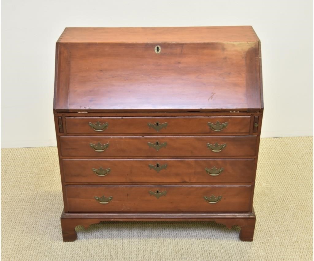 Appraisal: New Hampshire Chippendale cherry slant lid desk circa with pigeon-holed