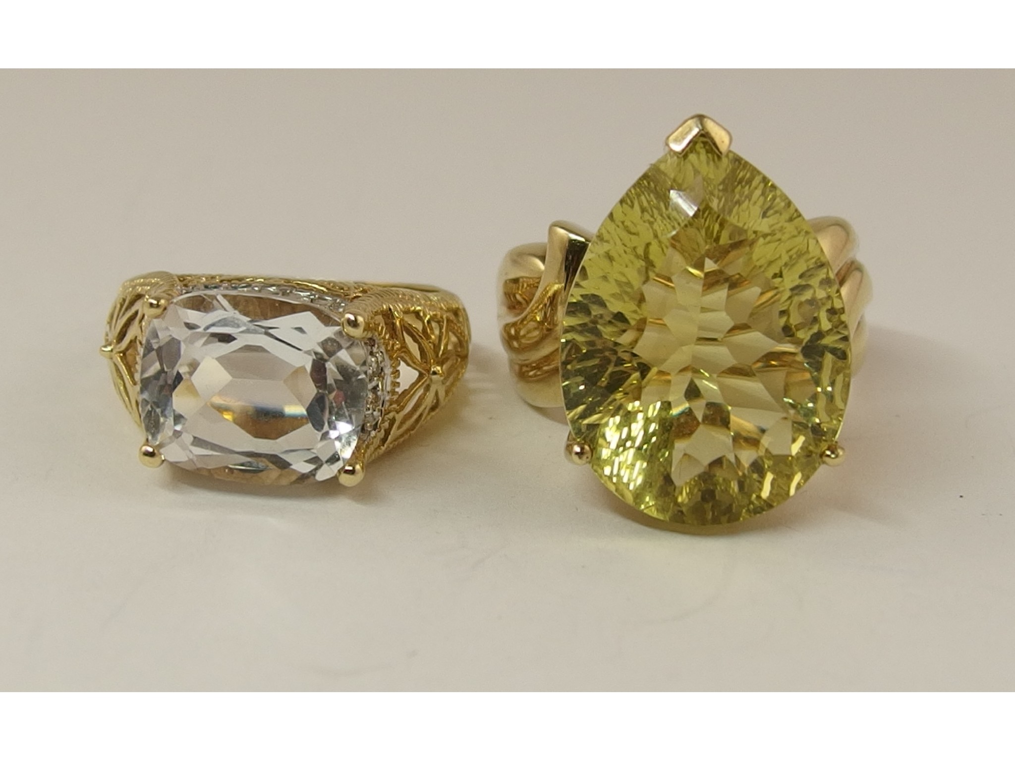 Appraisal: A ct gold lemon citrine ring and a ct topaz