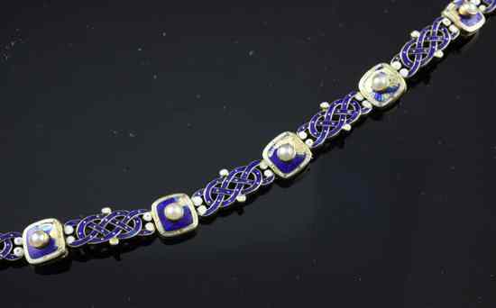 Appraisal: A late Victorian enamelled gold and pearl bracelet with inter-woven