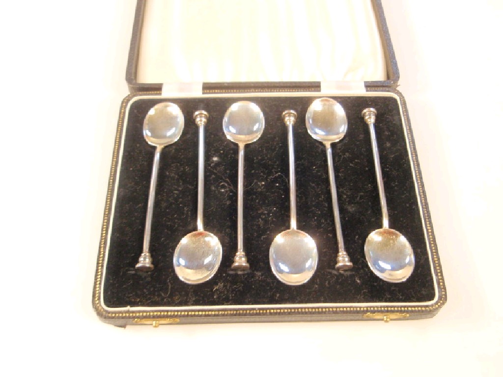 Appraisal: A set of six silver coffee spoons with seal tops