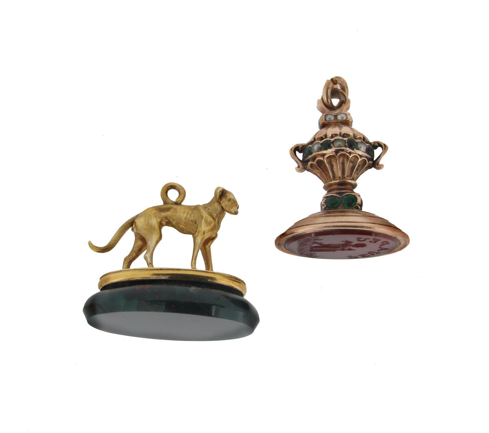 Appraisal: A bloodstone fob seal mounted with a gold dog