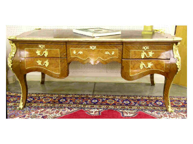 Appraisal: Louis XV style bureau plat with leather top and cast