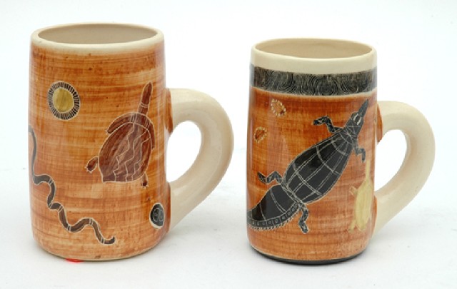 Appraisal: ESSEXWARE New South Wales circa Two ceramic mugs decorated with