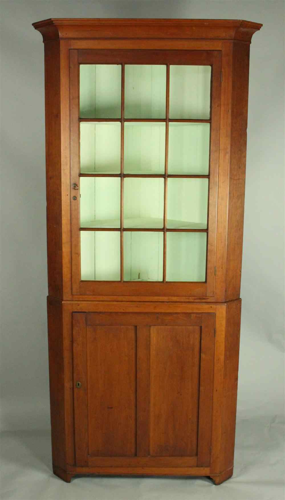 Appraisal: AMERICAN CHERRY CORNER CUPBOARD CIRCA in two parts the upper