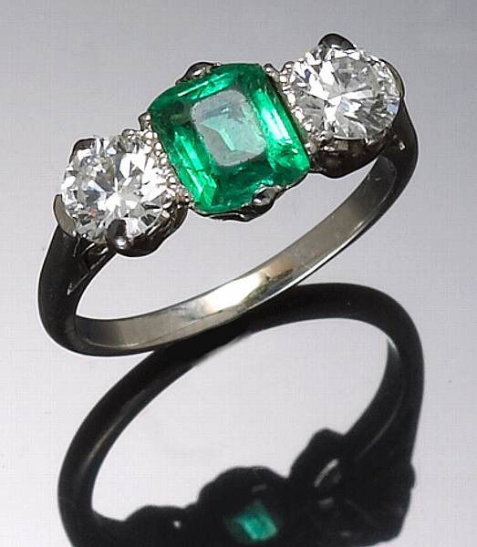 Appraisal: A diamond emerald and platinum ring size