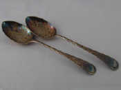 Appraisal: A pair of sterling silver Old English pattern table spoons